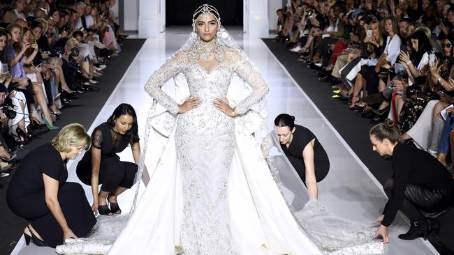 Meghan Markle will be requiring the dress-fluffing assistance of several of bridesmaids if she chose this gown from the 2017 fall/winter Haute Couture collection in Paris. Picture: AFP.