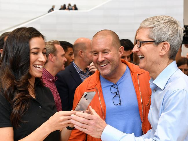 Apple CEO Tim Cook tests out a new iPhone X at Apple's new headquarters in Cupertino, California. Picture: AFP