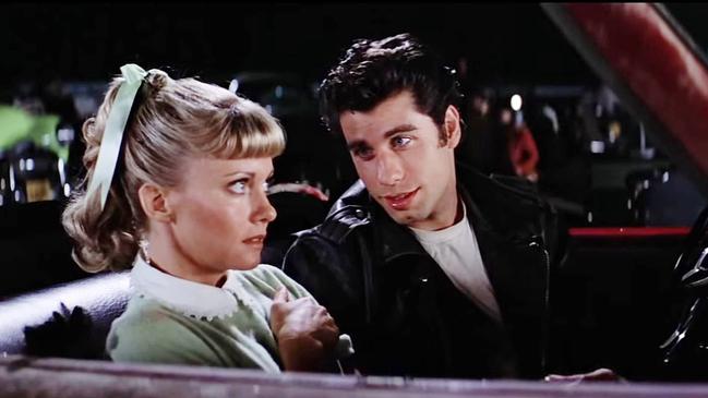 Danny trying to force Sandy to kiss him at the drive-in. Picture: Paramount Pictures