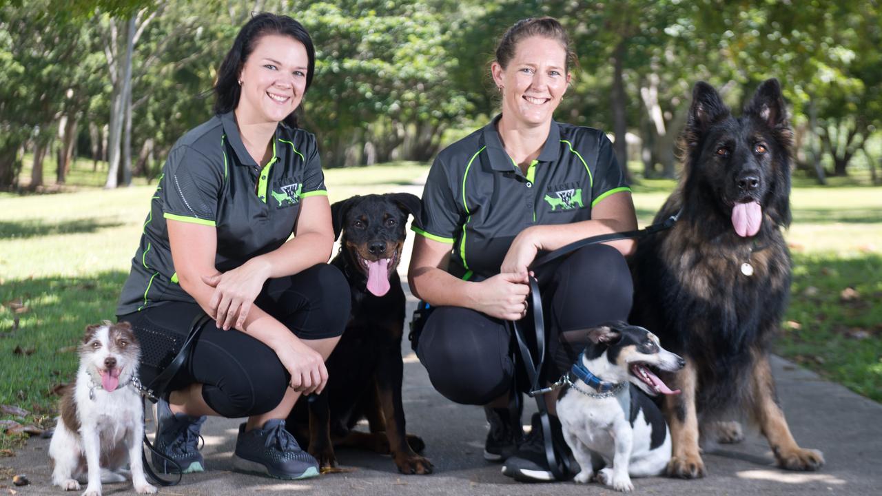 Ellen Young and Samantha Eeles with Ozzie, Kage, Pippa, and Ripley.