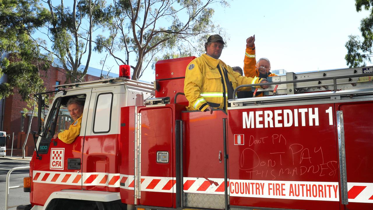 CFA volunteer firefighters and their trucks line the streets of Geelong to protest the fire levy. Picture: Alison Wynd