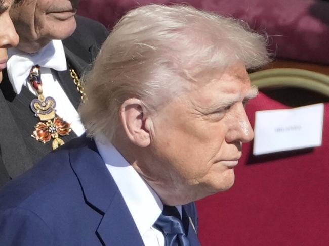 President Donald Trump and first lady Melania Trump arrive for the funeral of Pope Francis in St. Peter's Square at the Vatican, Saturday, April 26, 2025. (AP Photo/Markus Schreiber)