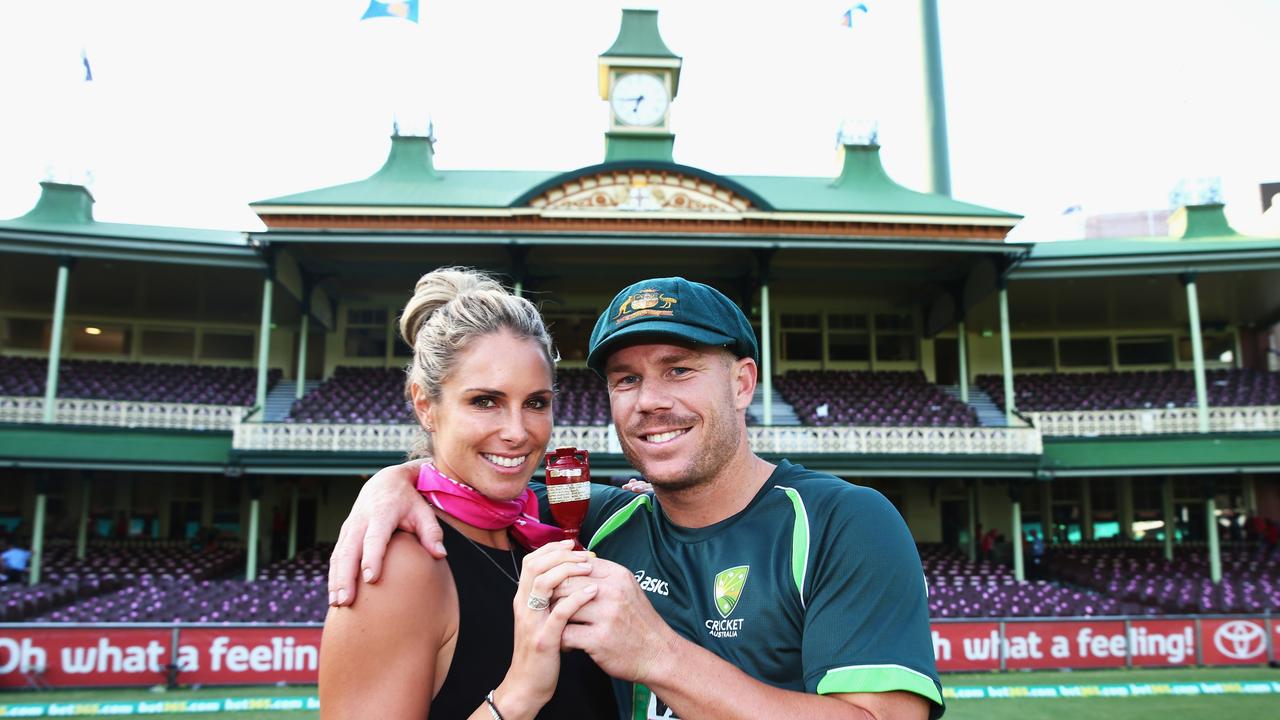 David Warner, wearing the baggy green, with his wife Candice. Picture: Ryan Pierse/Getty Images