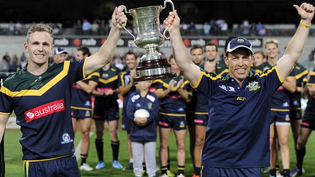 Joel Selwood and coach Alastair Clarkson after winning the Internationals Rules series against Ireland. Picture: Daniel Wilkins