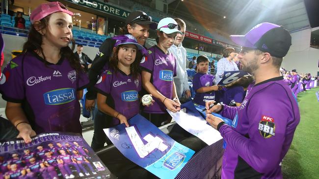 Matthew Wade of the Hurricanes signs autographs for supporters in the crowd after a Hurricanes v Renegades Big Bash League Match at Blundstone Arena on February 07, 2019 in Hobart, Australia. (Photo by Scott Barbour/Getty Images)