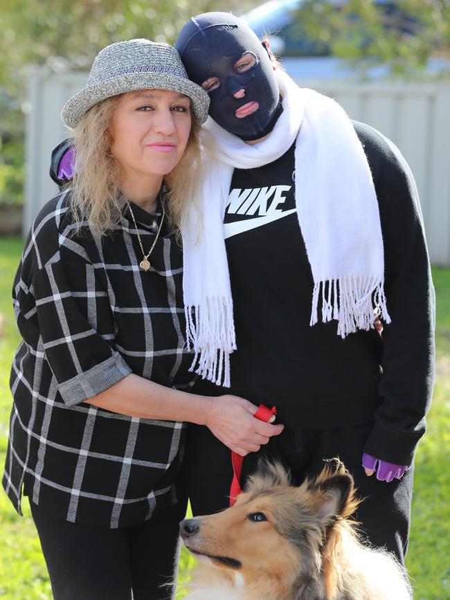 Stephanie, Marie and beloved pet dog Arlo. Picture: Alex Coppel.