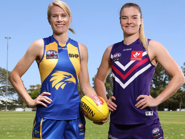 PERTH, AUSTRALIA - JANUARY 04: Dana Hooker of the West Coast Eagles and Hayley Miller of the Fremantle Dockers pose during the 2022 AFLW Season Launch Captains Media Opportunity at Melville Reserve on January 04, 2022 in Perth, Australia. (Photo by Paul Kane/Getty Images)