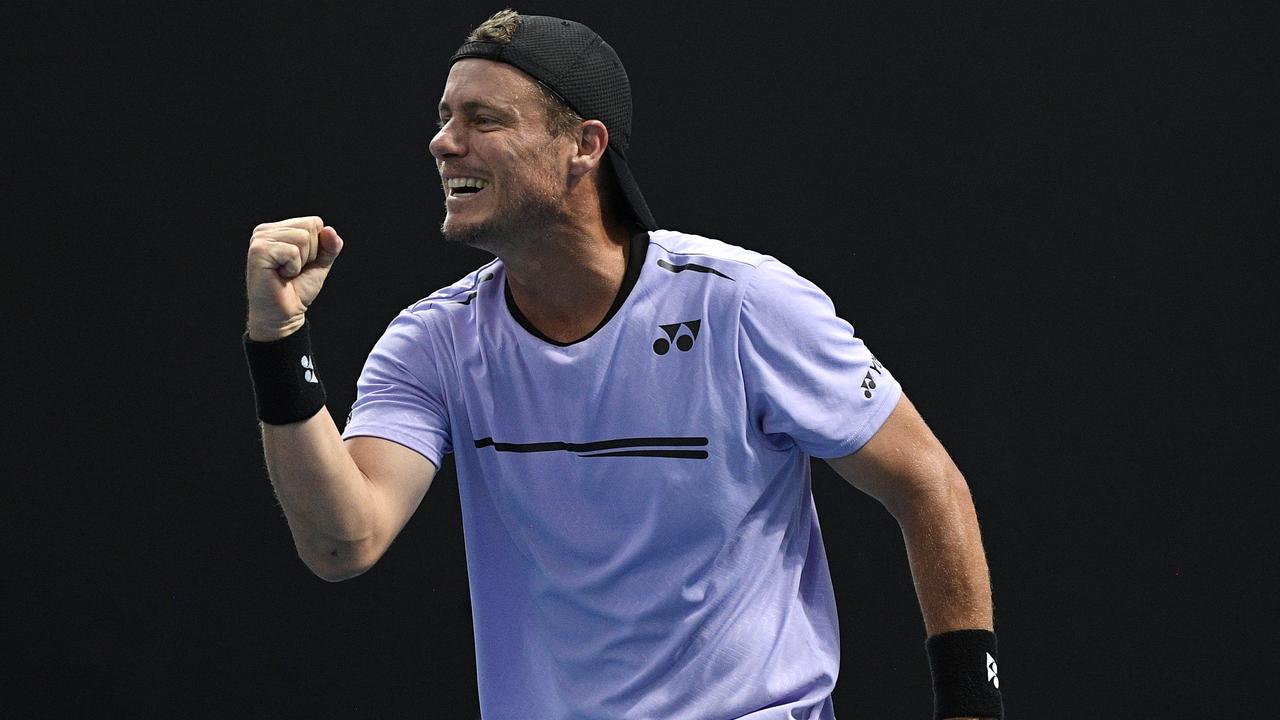 Lleyton Hewitt played doubles at the Australian Open. (AP Photo/Andy Brownbill)