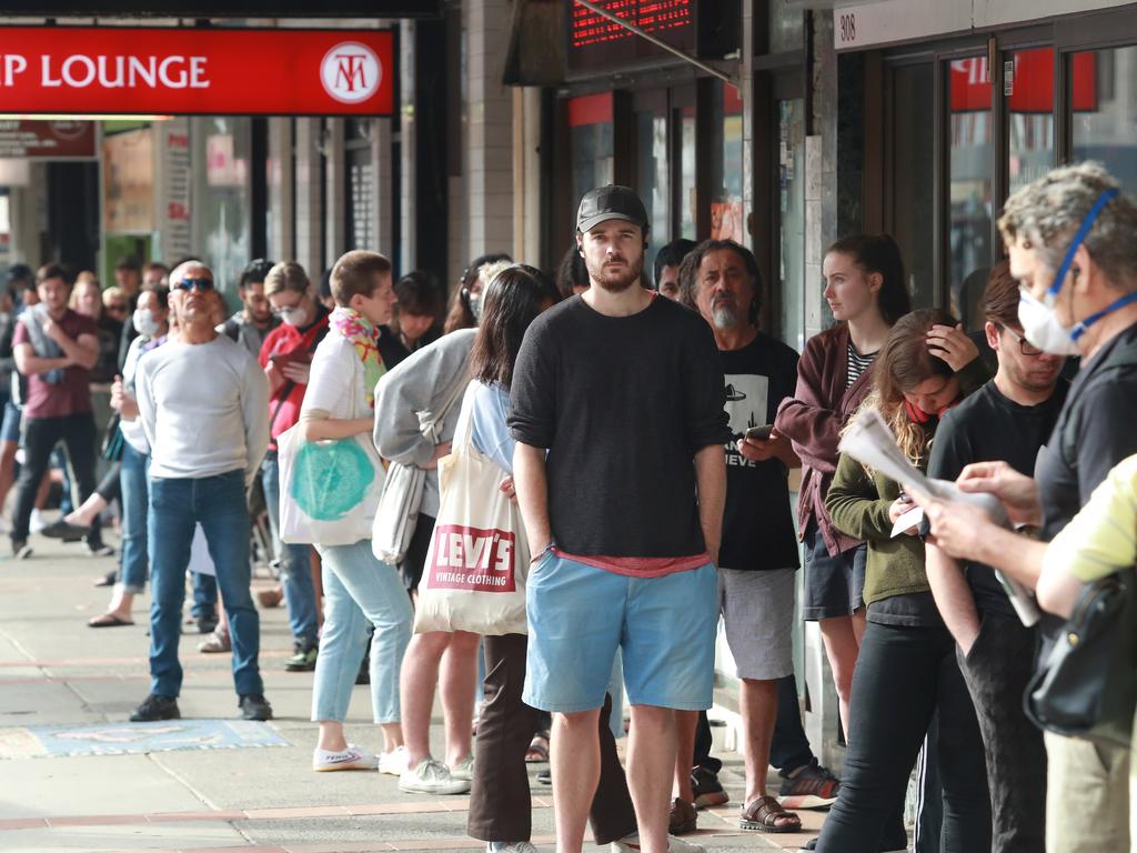 People queuing outside Centrelink at Marrickville in Sydney’s inner west on March 24, 2020 as job losses due to the coronavirus started to hit Australia. John Feder/The Australian.