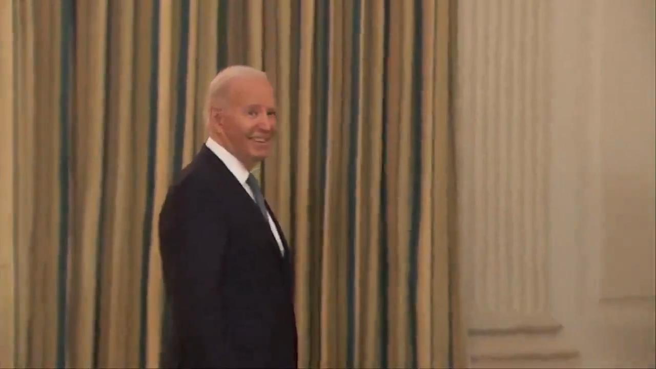US President Joe Biden was heading out the room when a reporter’s questions prompted him to stop.