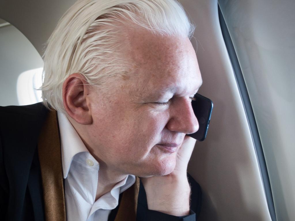 Julian Assange on the phone with Stella, posted to the WikiLeaks X page, with one hour left of his flight. Picture: WikiLeaks