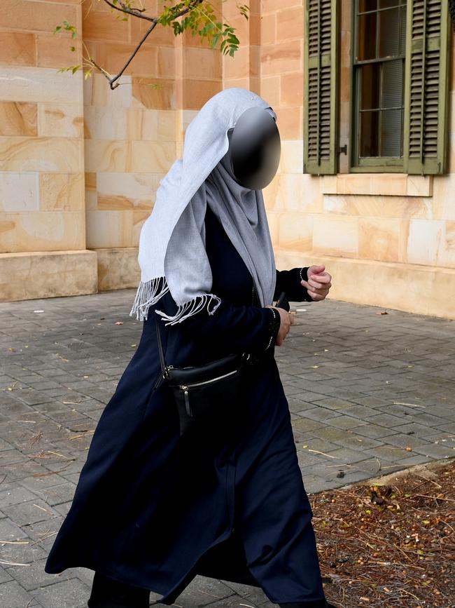 “Khour Zai", older sister of stabbing victim "Lour Zai", outside the Adelaide Magistrates Court. Picture: NCA NewsWire