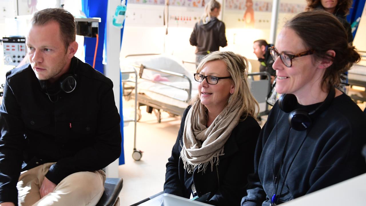 Birse (centre) on set with director Jeffrey Walker during the production of The Commons