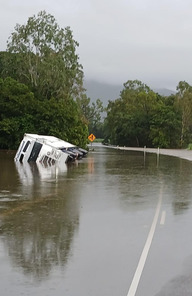 A truck came to grief attempting to navigate floodwaters covering the flood-prone Bruce Highway north of Ingham overnight. Picture: Supplied