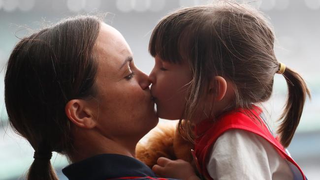 Daisy Pearce and daughter Sylvie share a kiss. Picture: Getty Images