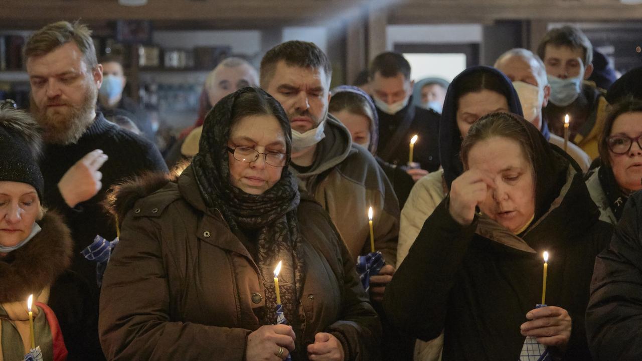 Relatives and comrades attend the funeral of Captain Anton Olegovich Sidorov, killed in shelling by separatist rebels in the east. Picture: Getty Images