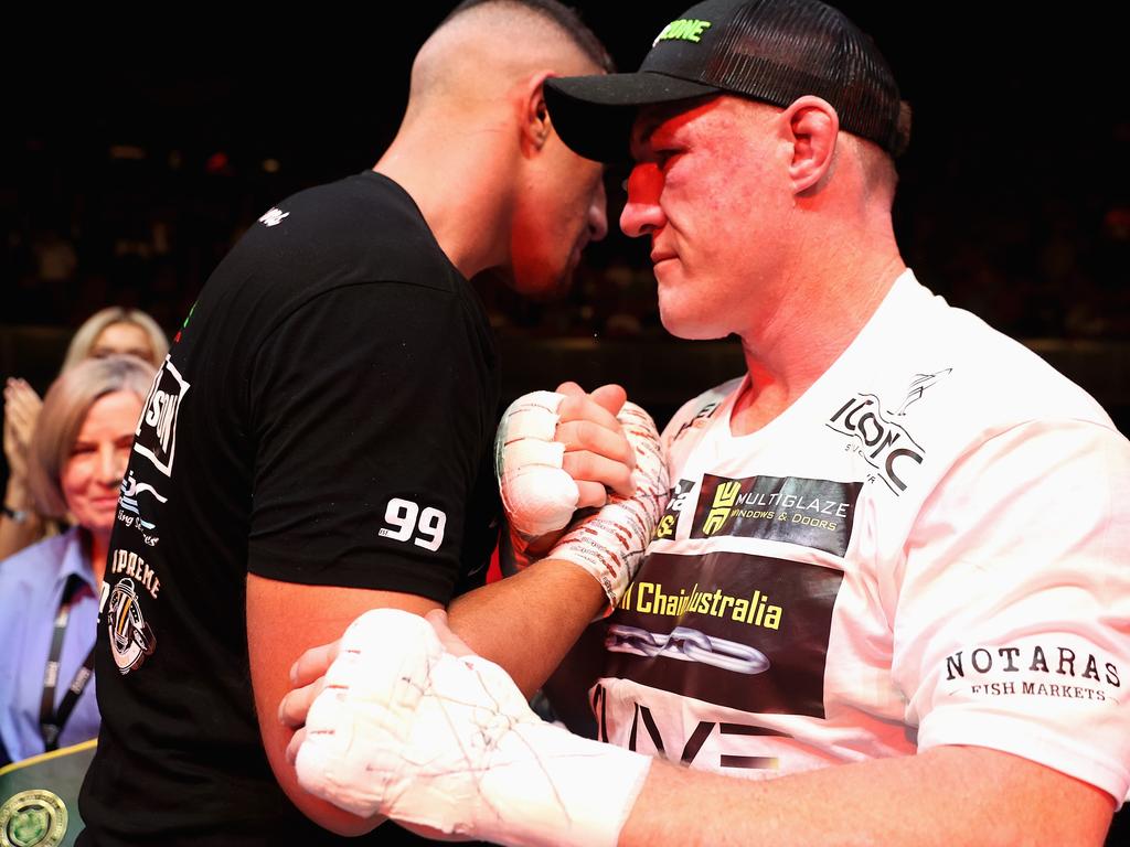 Justis Huni is embraced by Paul Gallen after winning their Australian heavyweight title fight.