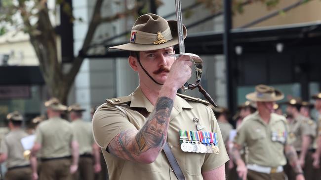 NEWS ADVANZAC Dawn ServiceMajor Andrew Evans (  0423 713 984 ) with commemorative swordPicture:Russell Millard