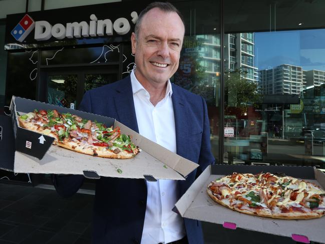 Domino's CEO Don Meij with pizzas at Domino's store. Pic Annette Dew