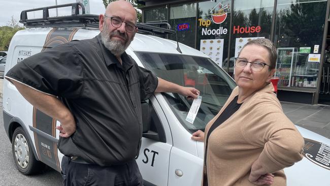 Parking sensors and ruthless inspectors have led to five fines for Harold and Deb Shugg for parking their car in a one-hour zone out the front of their Mitcham cafe. Picture: Kiel Egging.