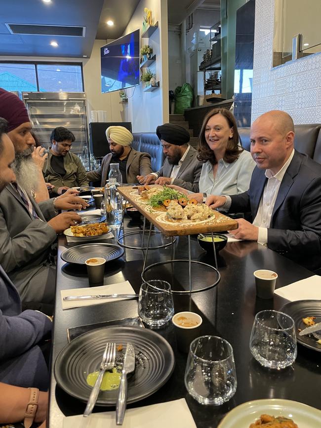 Parramatta Liberal candidate Maria Kovacic and Josh Frydenberg eat at Punjabi Fusion Lounge Bar &amp; Restaurant, Harris Park.