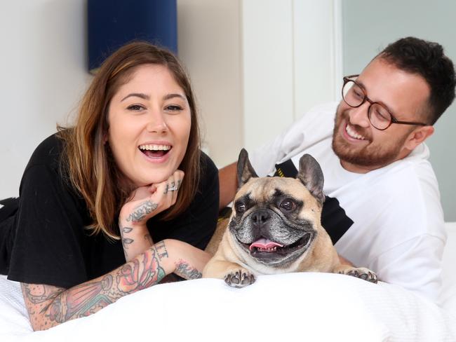 Sarah Prgomelja, 30, and fiance Jamie Hayman, 29, who have a French bulldog named Edgar, 5. Picture: Richard Dobson 