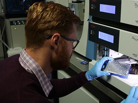 Dr Matt Dun at work at the Hunter Medical Research Institute.