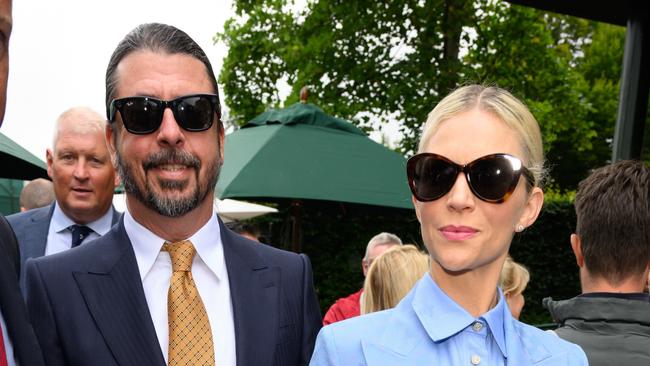 Grohl and wife Jordyn Blum pictured at Wimbledon in July. Picture: Karwai Tang/WireImage