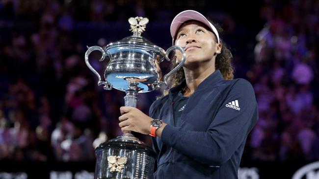 Japan’s Naomi Osaka poses with her trophy after defeating Petra Kvitova in the women’s singles final at the Australian Open. Picture: AP