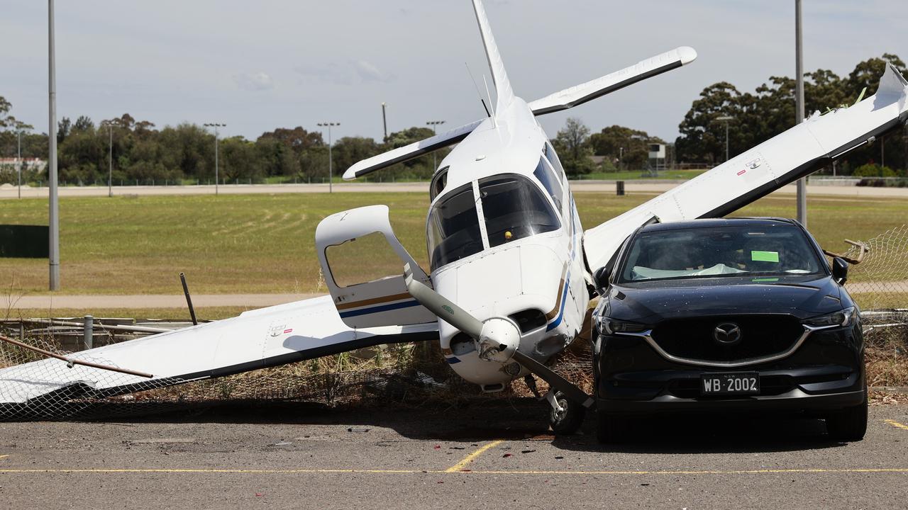 Piper plane crash lands, hits car at Bankstown Raceway in Sydney