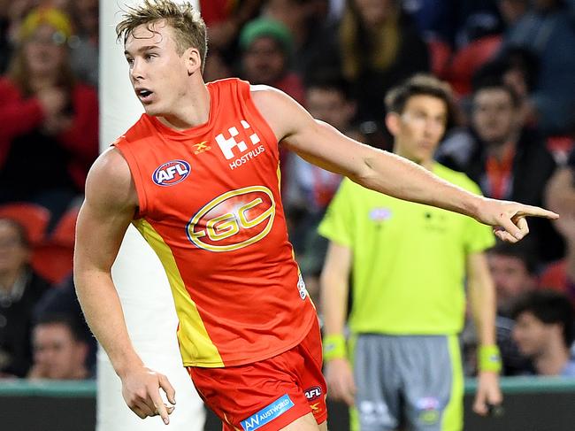 Suns player Tom Lynch reacts after kicking a goal during the Round 7 AFL match between the Gold Coast Suns and the Geelong Cats at Metricon Stadium in Carrara on the Gold Coast, Saturday, May 6, 2017. (AAP Image/Dave Hunt) NO ARCHIVING, EDITORIAL USE ONLY