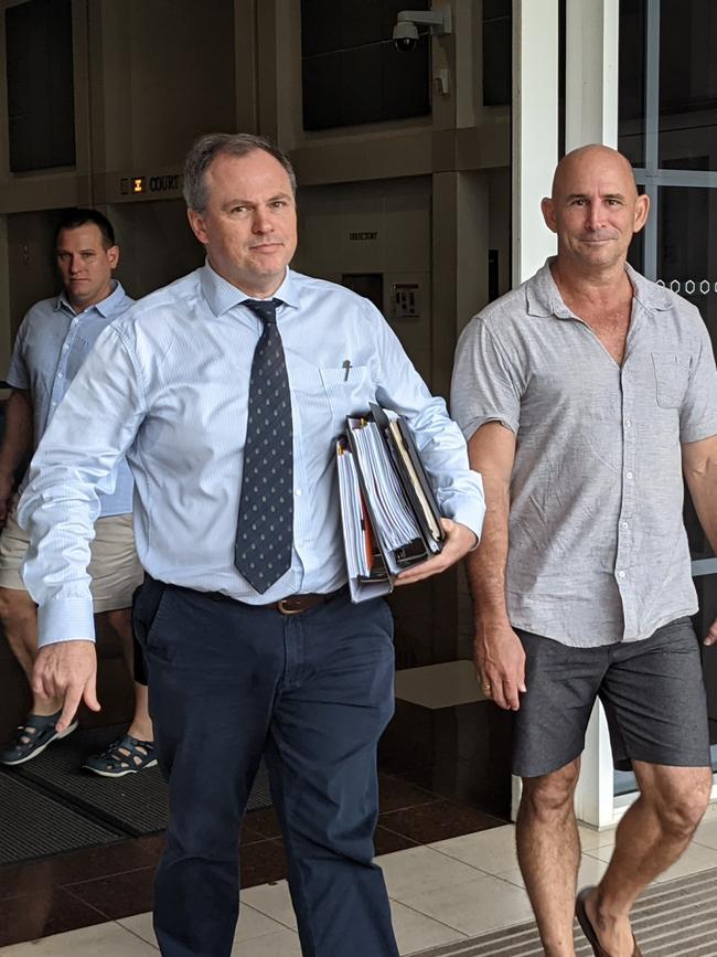 Lawyer Danial Kelly, left, leaving Darwin's Supreme Court following a directions hearing challenging the NT Government's vaccine mandate on Wednesday December 22. Picture: Zizi Averill