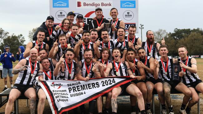 EFNL 2024: Scoresby celebrates the 2024 division 4 flag. Picture: Davis Harrigan