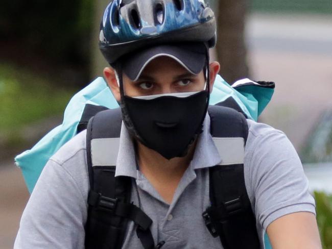 Pictured is a Deliveroo rider outside St Vincent's Hospital in Darlinghurst on the Tuesday 17th of March 2020.Picture: Christian Gilles