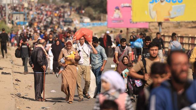 Families flee northern Gaza on Thursday. Picture: AFP