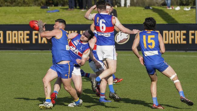 SFL: Cranbourne’s Marc Holt marks strongly. Picture: Valeriu Campan