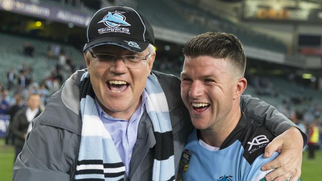 Former prime minister Scott Morrison and Chad Townsend embrace after the halfback’s field goal in the 2018 finals. Picture; AAP Image/Craig Golding