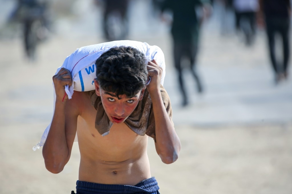 Thousands of Palestinians loot UN warehouse in central Gaza: AFP journalist