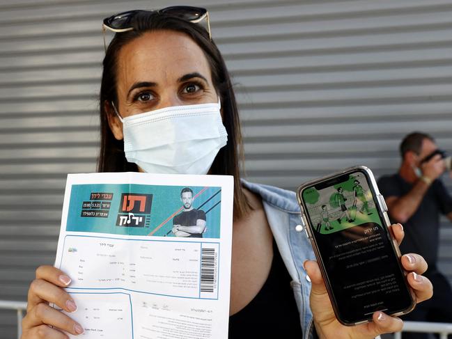 Israel was the first country to introduce a temporary system called the “green pass” earlier this year – a QR code that people showed to prove their vaccination status. Picture: AFP