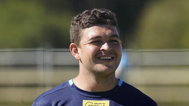 Ash Taylor smiles during the Gold Coast Titans training session on the Gold Coast, Monday, May 11, 2020. The NRL loosened COVID-19 restrictions today with contact work allowed to resume at training sessions. (AAP Image/Dave Hunt)