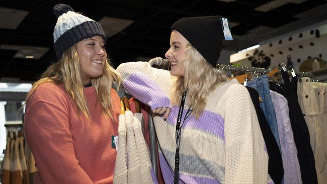 Jazmin Cocking and Paige Redgwell from Cairns City fashion retail outlet Quicksilver are embracing the cold snap. Picture Emily Barker