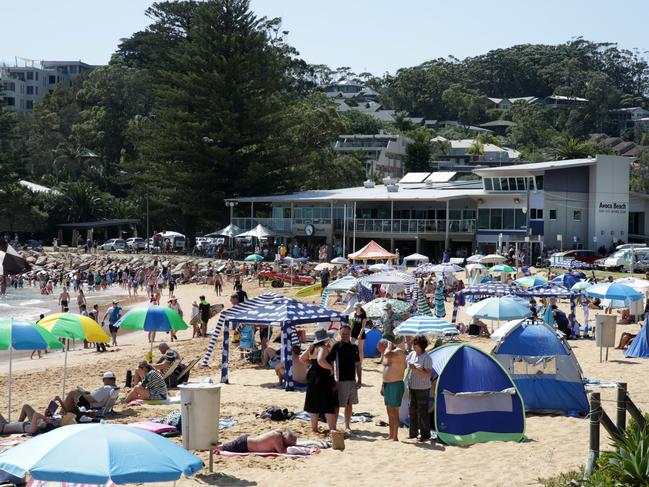 Beaches have been packed on the Coast this year. (AAP Image / Mark Scott)