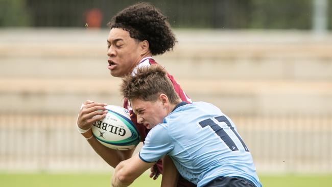 Waratah’s player Tom Hartman makes a tackle Picture: Julian Andrews