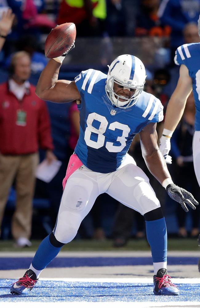 Dwayne Allen #83 of the Indianapolis Colts celebrates after scoring a touchdown.