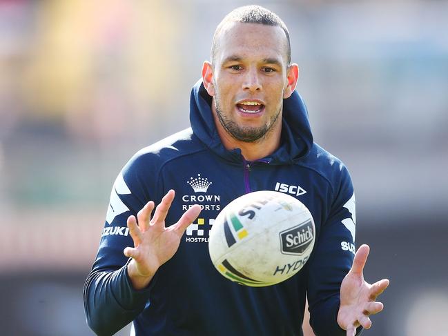 MELBOURNE, AUSTRALIA - SEPTEMBER 11:  Will Chambers of the Storm accepts a pass during a Melbourne Storm NRL training session at Gosch's Paddock on September 11, 2018 in Melbourne, Australia.  (Photo by Michael Dodge/Getty Images)