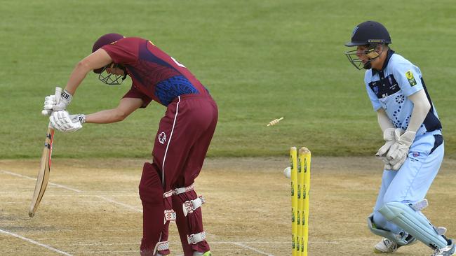 ALICE SPRINGS, AUSTRALIA - FEBRUARY 03: Brock McLachlan of Queensland is bowled out by Benjamin Mitchell of New South Wales during the National Indigenous Cricket Championships Men's Final match between New South Wales and Queensland at Traeger Park on February 03, 2020 in Alice Springs, Australia. (Photo by Albert Perez - CA/Cricket Australia via Getty Images)