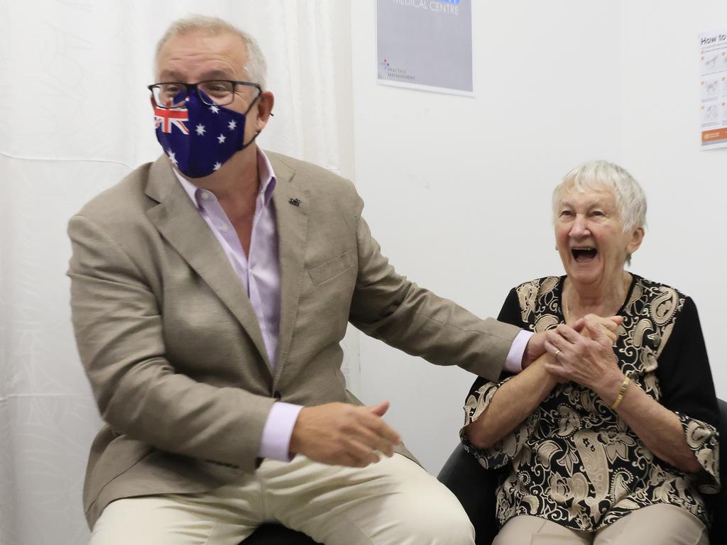 Australian Prime Minister Scott Morrison reacts with Jane Malysiak after the mishap. Picture: Mark Evans/Getty Images