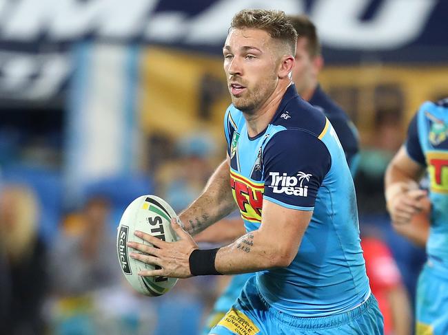 GOLD COAST, AUSTRALIA - APRIL 28: Bryce Cartwright of the Titans runs the ball during the round eight NRL match between the Gold Coast Titans and Cronulla Sharks at Cbus Super Stadium on April 28, 2018 in Gold Coast, Australia. (Photo by Chris Hyde/Getty Images)