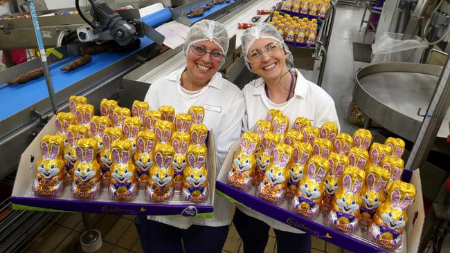 Lidia Pilot and Clair Stacey show off the Easter bunnies at the Cadbury factory in Ringwood. Picture: Stuart Milligan