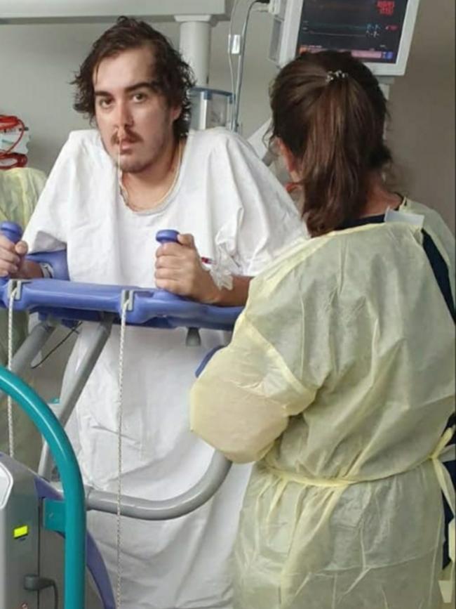 Jack McIlvar standing for the first time in January 2020 – four months after diagnosis. Picture: Supplied by family